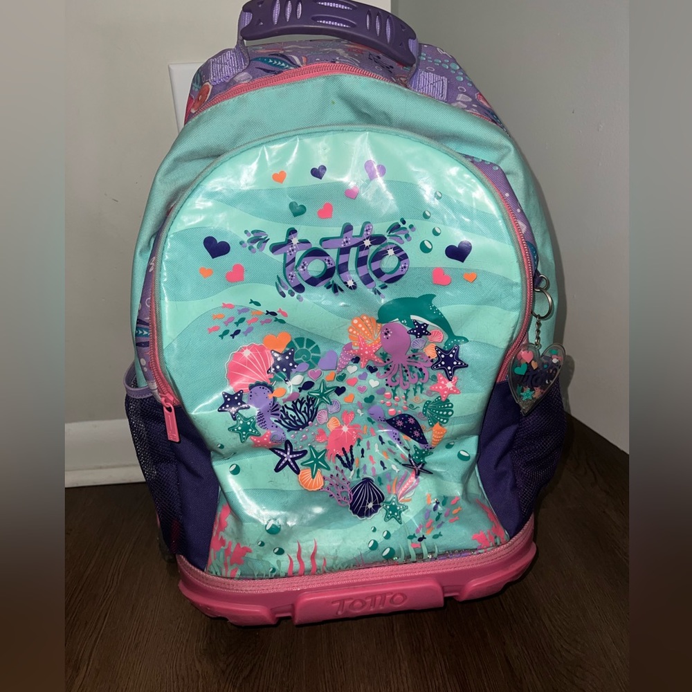 Toto rolling backpack